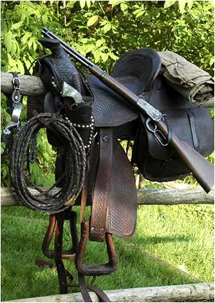 guns and saddles
